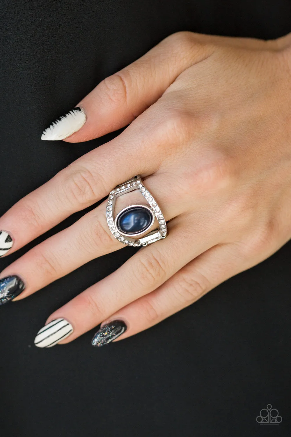 Radiating Riches - Blue Paparazzi Ring